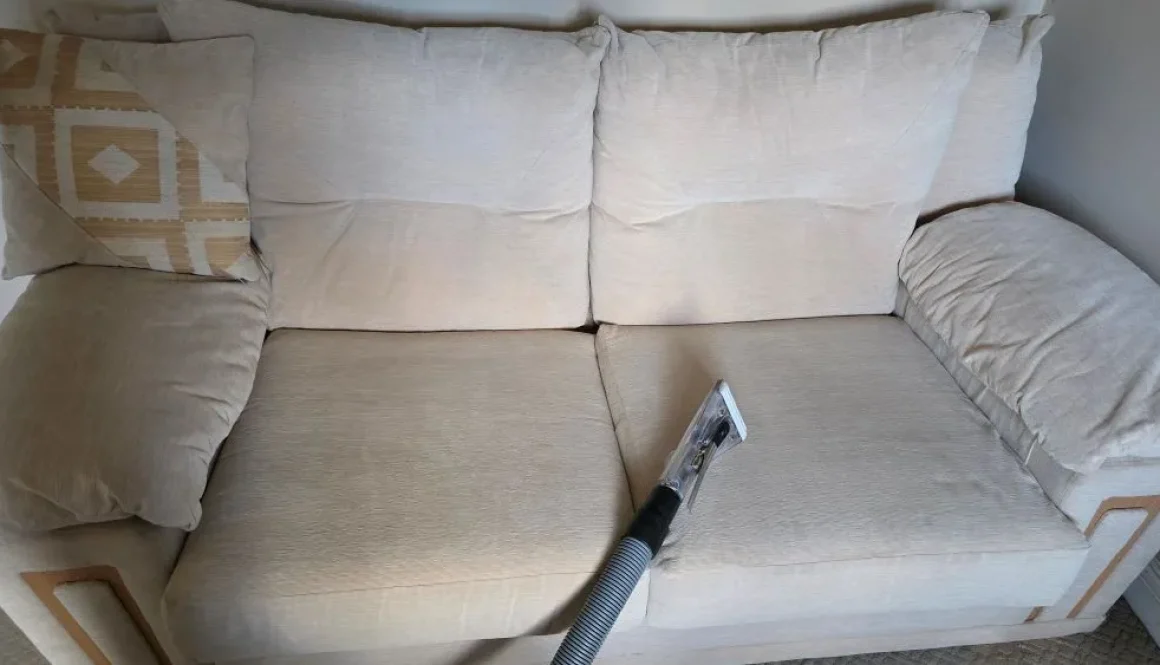 professional upholstery cleaning Ely – cream sofa deep cleaned with extraction tool visible