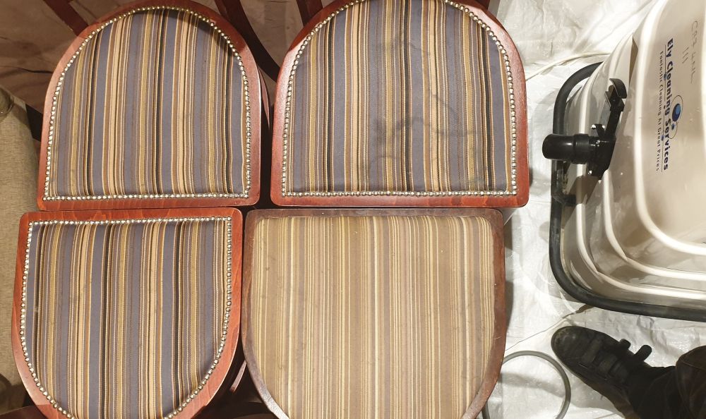 Professional upholstery cleaning in Newmarket - heavily stained fabric dining chairs before deep cleaning treatment.