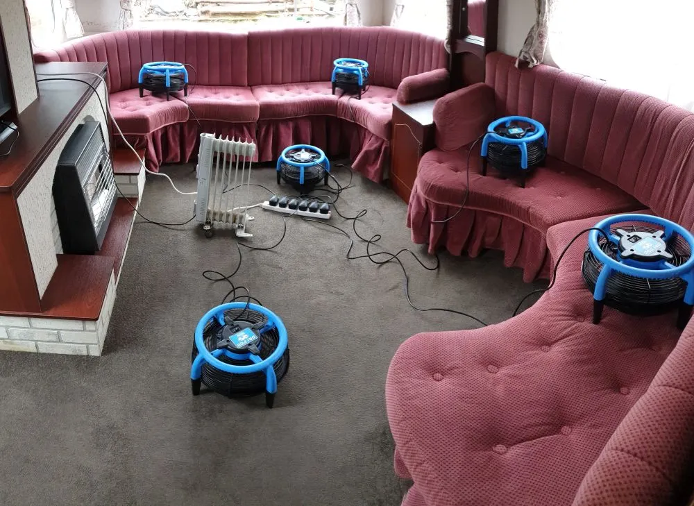 Professional corner sofa cleaning in Newmarket - using Dri-Pod air movers for fast drying.